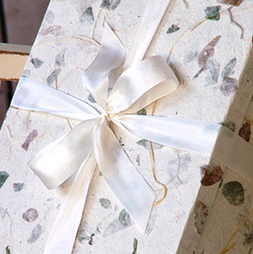 Handmade keepsake gift box with tissue and ribbon