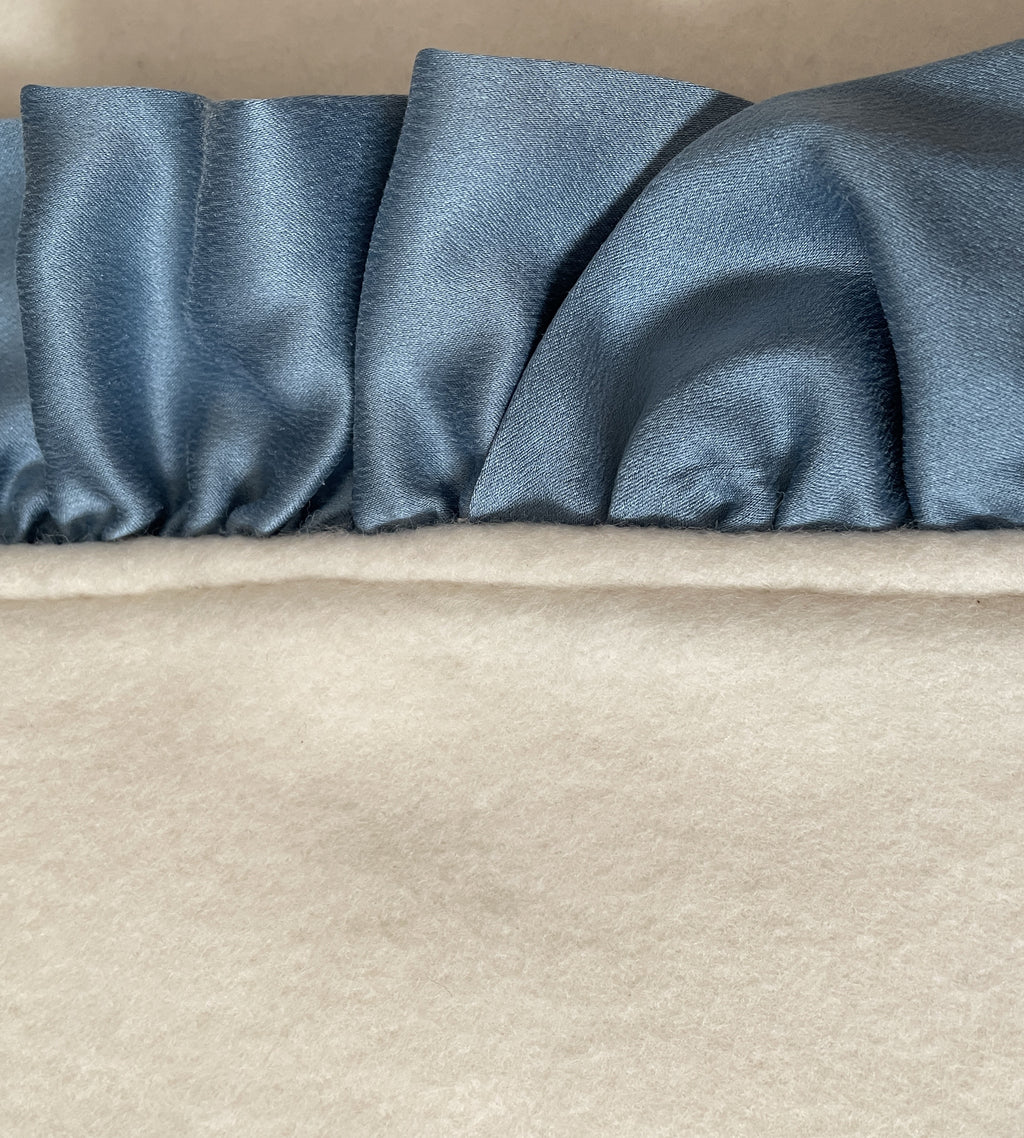 Real silk charmeuse ruffle on organic cotton fleece — blue, close-up showing silk weave