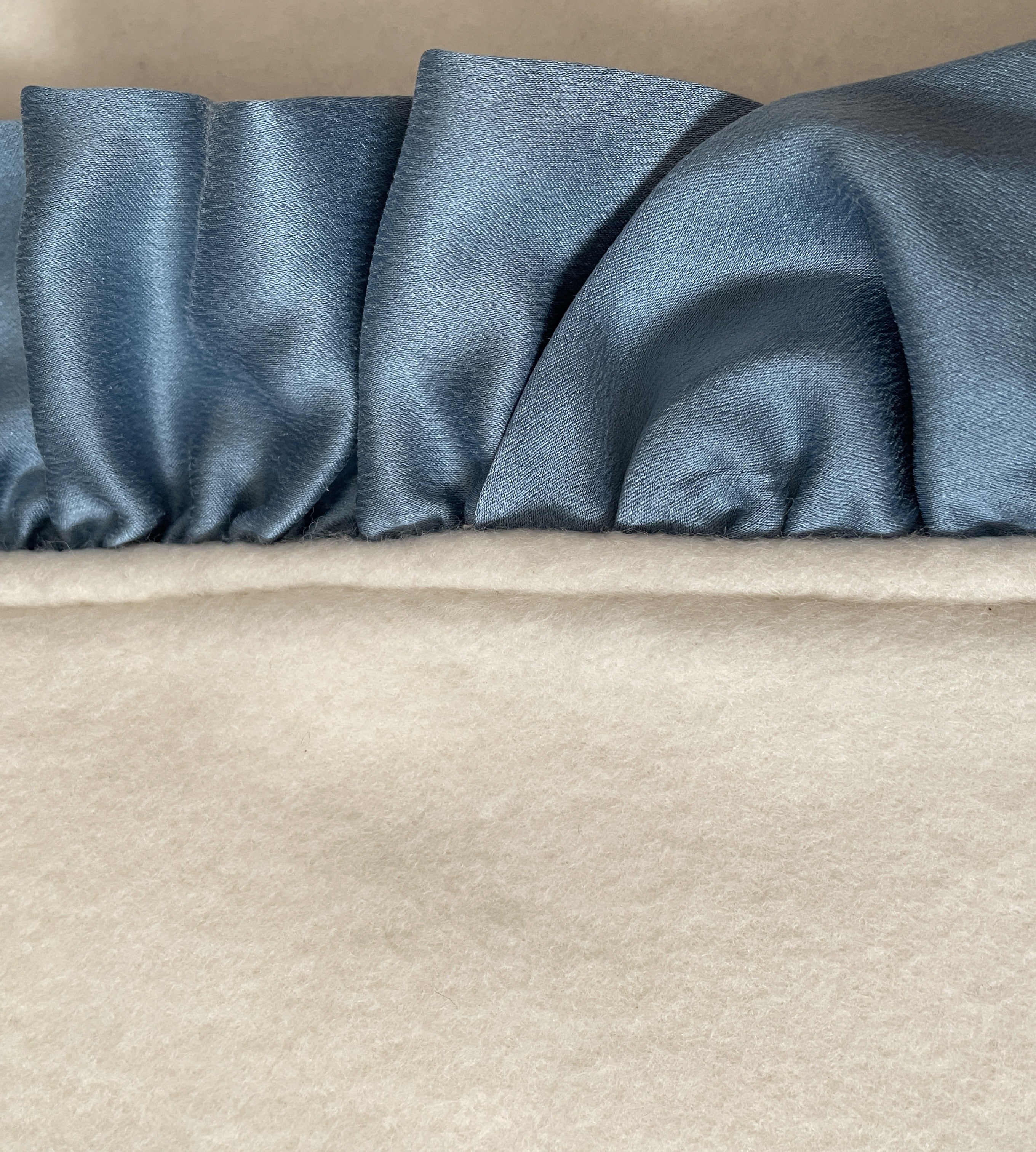 Real silk charmeuse ruffle on organic cotton fleece — blue, close-up showing silk weave
