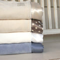 Organic cotton velour baby blankets with straight silk trim, stacked